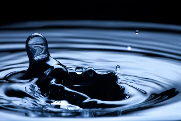 Plusk wody, Zamknij się, kolor niebieski — Zdjęcie stockowe