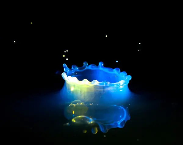 Milk splash and flying drops, abstract liquid — Stock Photo, Image
