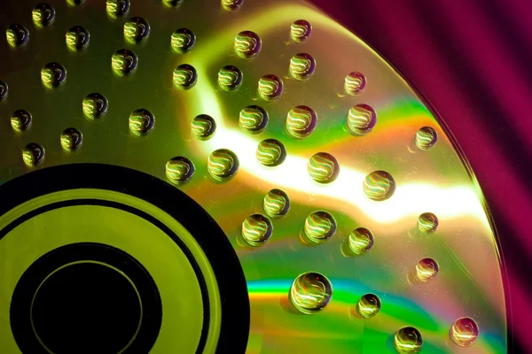 Abstract music background, water drops on CD DVD — Stock Photo, Image