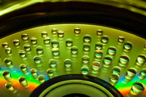 Абстрактний музичний фон, краплі води на CD DVD — стокове фото