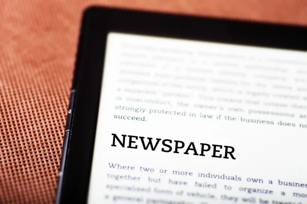 Newspaper on ebook, tablet concept — Stock Photo, Image