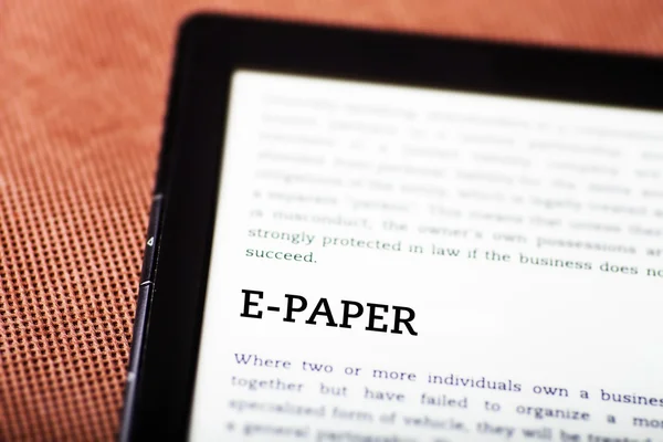 E-paper on ebook, tablet concept — Stock Photo, Image