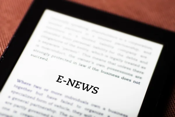 E-news on ebook, tablet concept — Stock Photo, Image