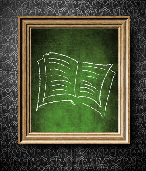 Book symbol chalkboard in old wooden frame — Stock Photo, Image