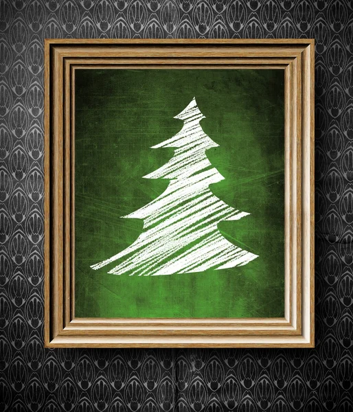 Kerstboom symbool schoolbord in oude houten frame — Stockfoto