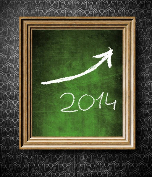 Growth trend of 2014 with copy-space chalkboard in old wooden frame — Stock Photo, Image