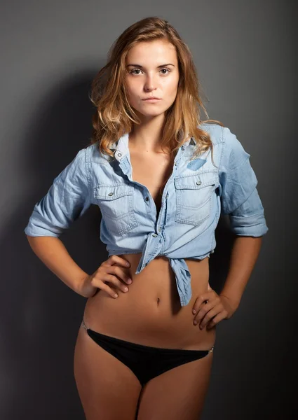 Hot natural woman body in jeans shirt jacket and panties — Stock Photo, Image