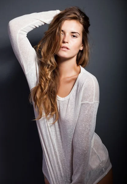 Portrait of hot woman in long sleeve white t-shirt — Stock Photo, Image