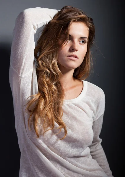 Portrait of hot woman in long sleeve white t-shirt — Stock Photo, Image