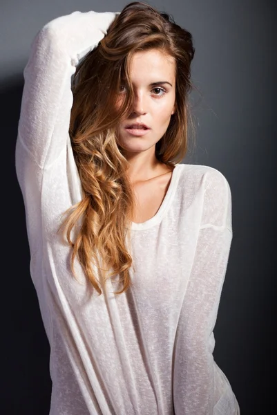 Portrait of hot woman in long sleeve white t-shirt — Stock Photo, Image