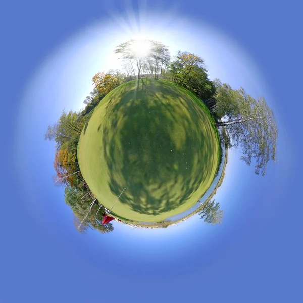 Little tiny planet with grass field and trees. Small world isolated — Stock Photo, Image