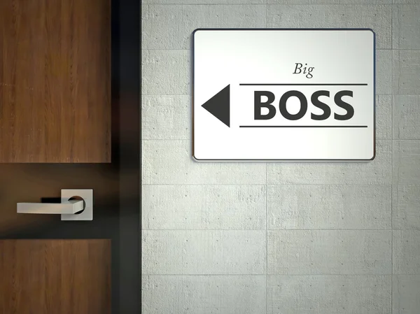 Большой знак босса висит рядом с офисом — стоковое фото