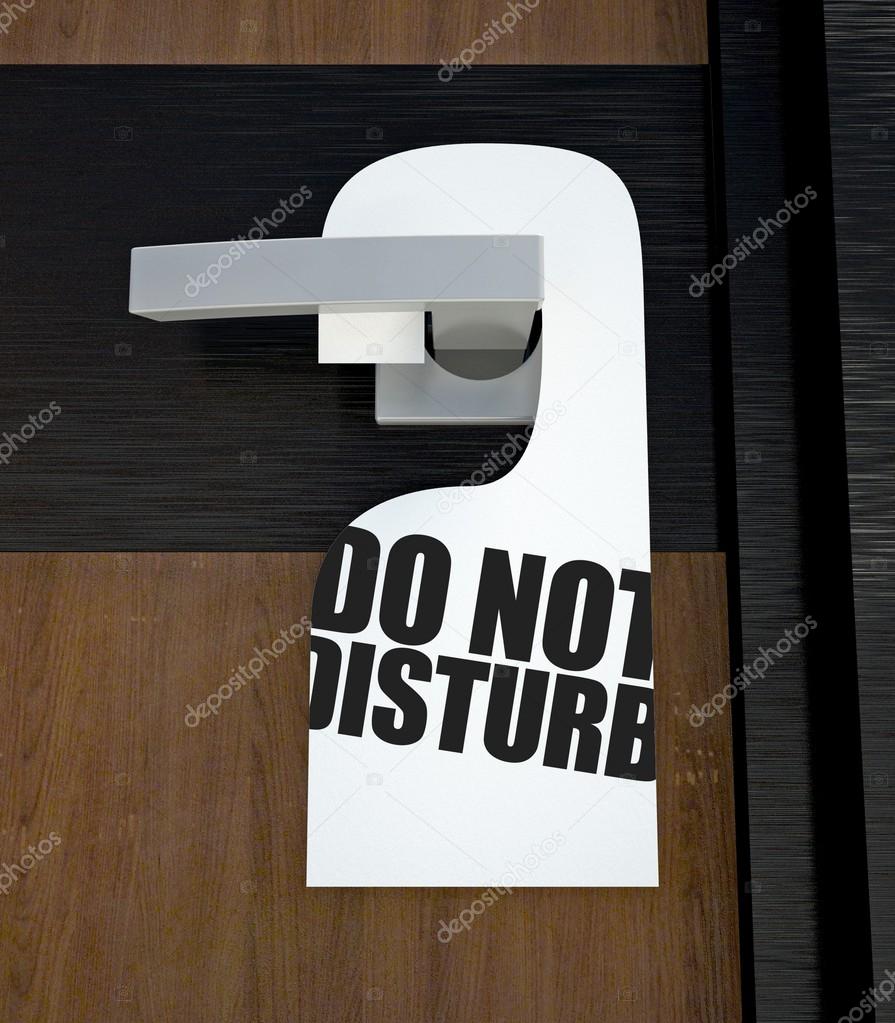 Door hanger Do not disturb message on handle — Stock Photo