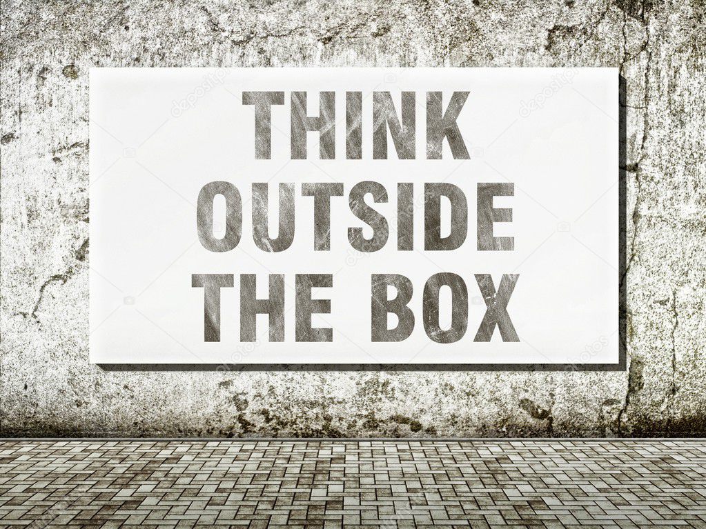 Think outside the box, words on wall