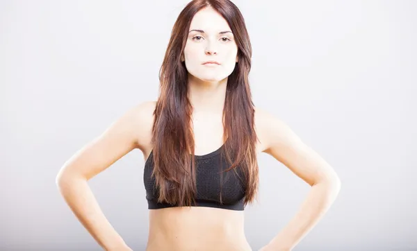 Attractive young athletic woman, sports bra — Stock Photo, Image