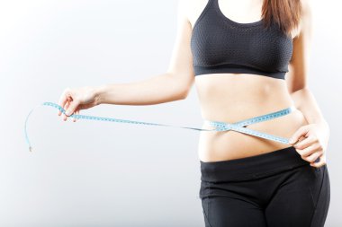 kadının karnı egzersiz sonrası ölçüm