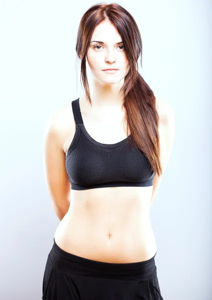 Attractive young athletic woman, sports bra — Stock Photo, Image