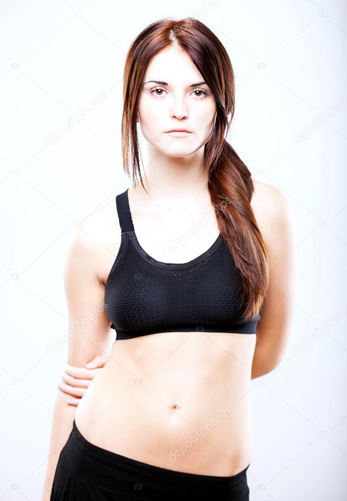Gorgeous Young Brunette Wearing Sports Bra Stock Photo By ©eugenef 93388506