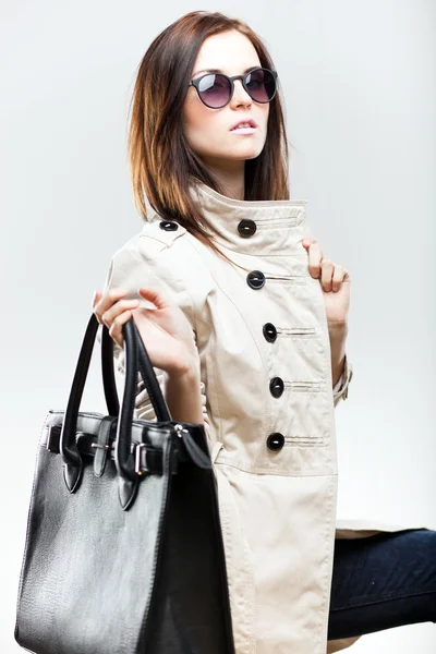 Fashionable woman with black leather bag — Stock Photo, Image