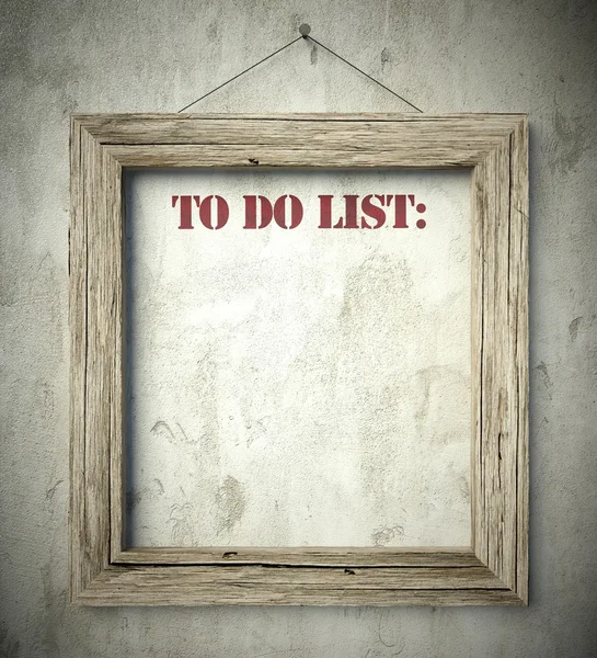 To do list in old wooden frame on wall — Stock Photo, Image