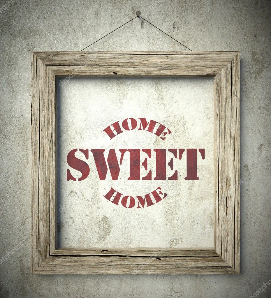 Home sweet home emblem in old wooden frame