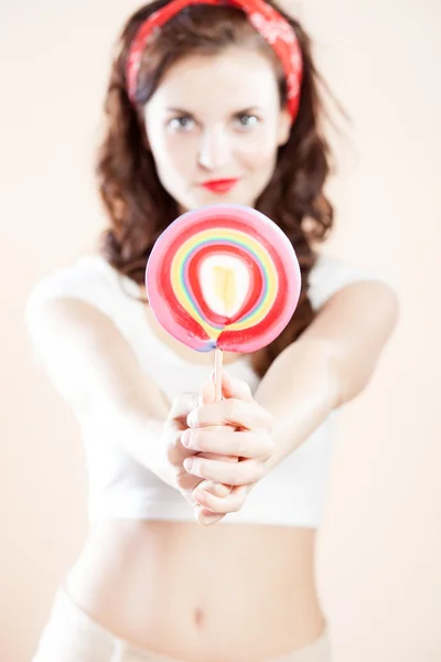 Pin up girl with big lollipop — Stock Photo, Image