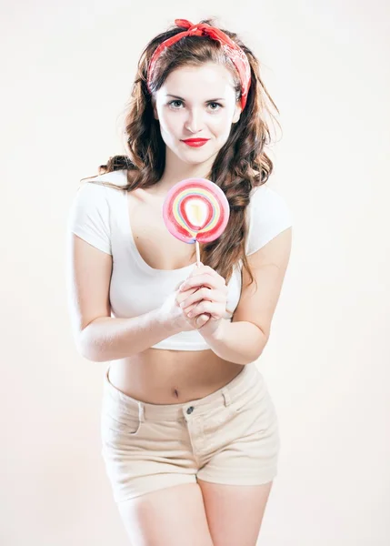 Pin up girl with big lollipop — Stock Photo, Image
