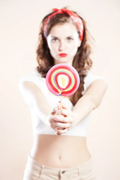 Pin up girl with big lollipop — Stock Photo, Image