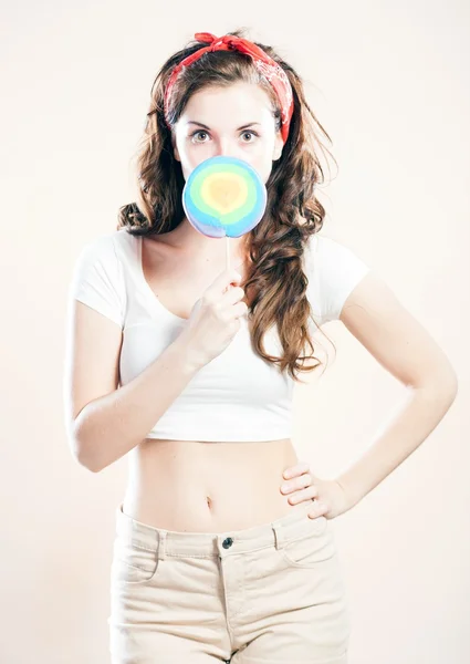 Pin up girl with big lollipop — Stock Photo, Image