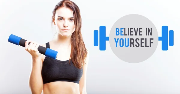 Believe in yourself slim woman with dumbbell — Stock Photo, Image