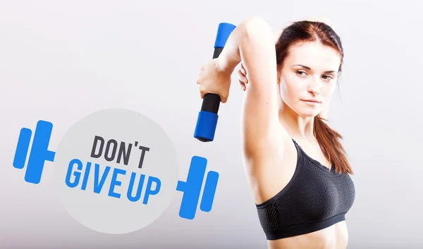 Dont give up slim woman with dumbbell — Stockfoto