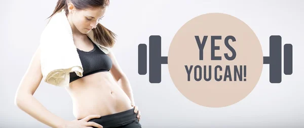 Yes you can, woman looking at flat belly — Stock Photo, Image