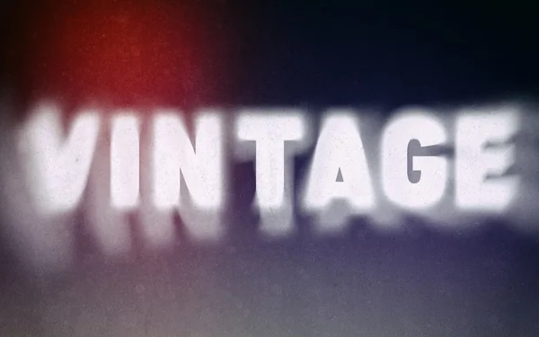 Vintage word on blurred background — Stock Photo, Image