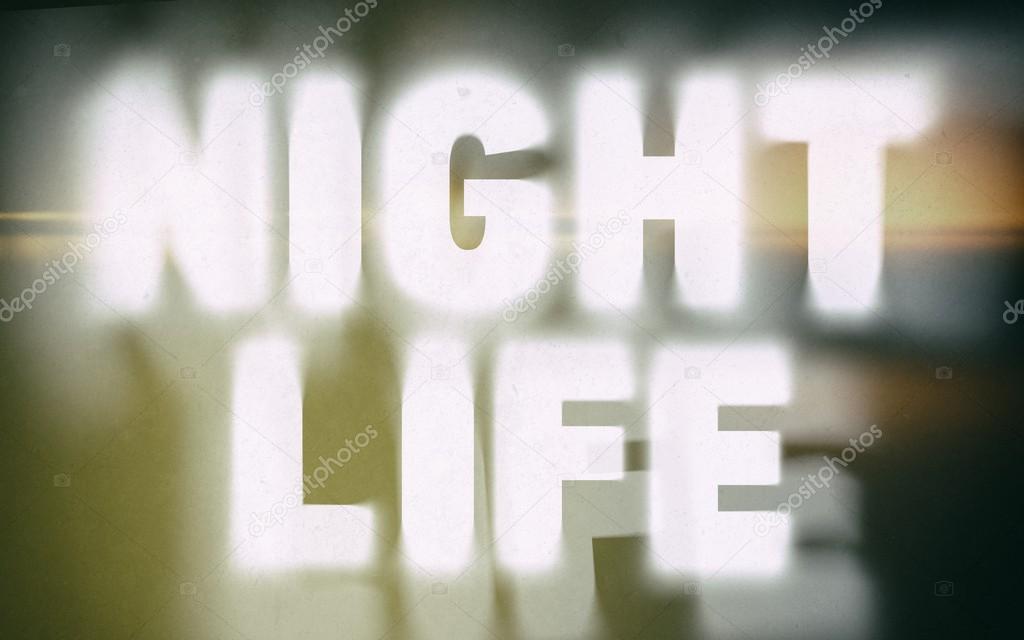 Night life word on vintage blurred background — Stock Photo