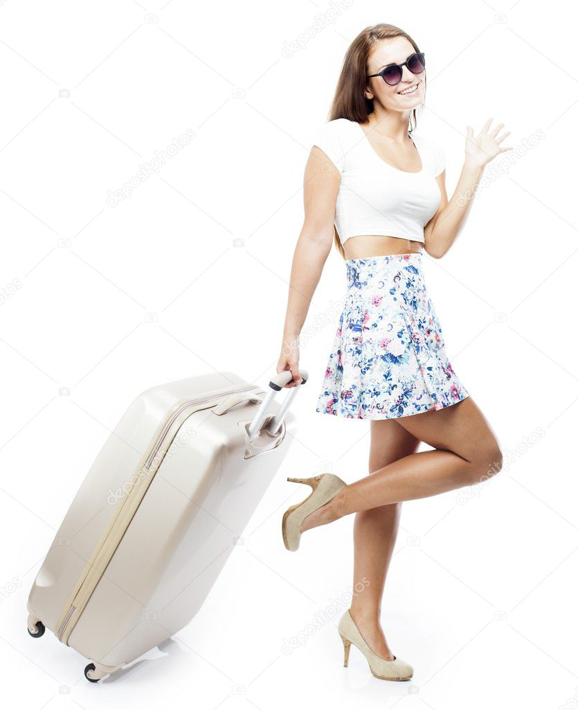 Tourist woman with suitcase waving hand isolated