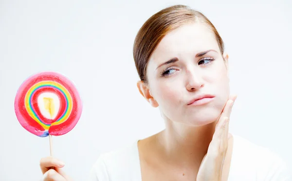 Woman having toothache after eating sweets — Stock Photo, Image