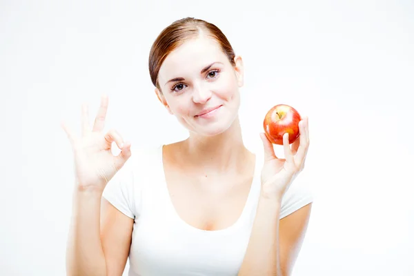 Woman holding and eating red apple, Healthy teeth — Stock Photo, Image