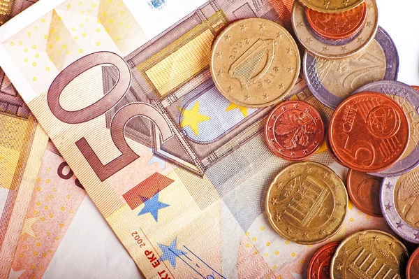 Notas e moedas em euros — Fotografia de Stock