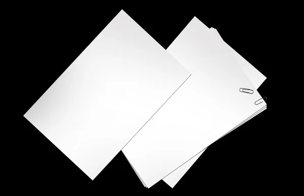 Papel em branco isolado em preto — Fotografia de Stock