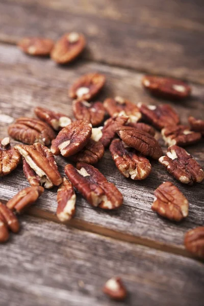 Pecans on Wood — Stock Photo, Image