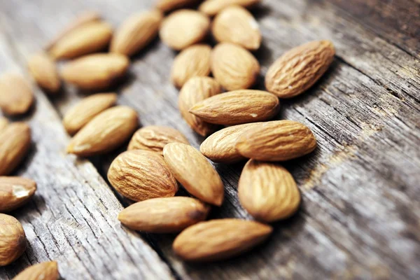 Raw Almonds on Wood — Stock Photo, Image