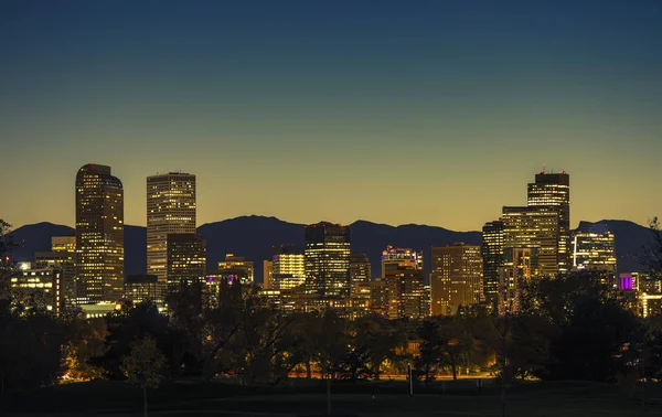 Illuminated Denver Downtown Towers Front Range Mountains Background Denver Colorado — стоковое фото