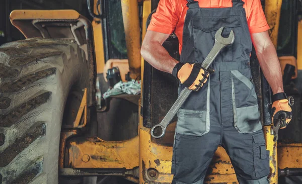 Heavy Construction Equipment Mechanic Large Wrench His Hand Staying Front — Stok fotoğraf