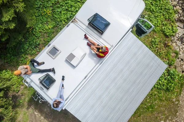 Caucasian Family Chilling Out Top Camper Van Motorhome Enjoying Summer — Stok fotoğraf