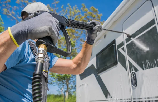 Powerful Pressure Washing Camper Van Rental Company Worker Cleaning Motorhome — Fotografia de Stock