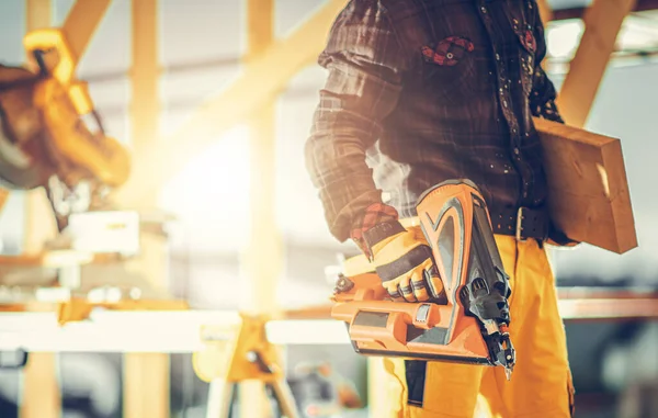 Construction Contractor Nail Gun His Hand Working New Developed Wooden — Stock Photo, Image