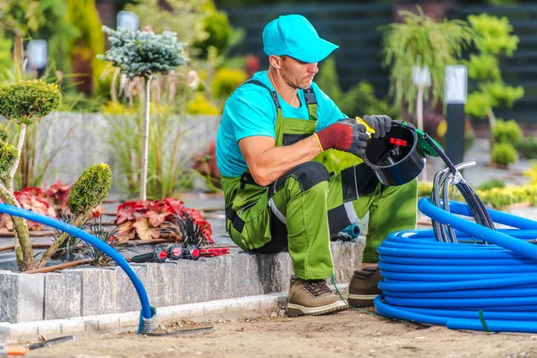 Caucasian Garden Landscaper His 40S Building Backyard Irrigation System Checking — Stock Fotó