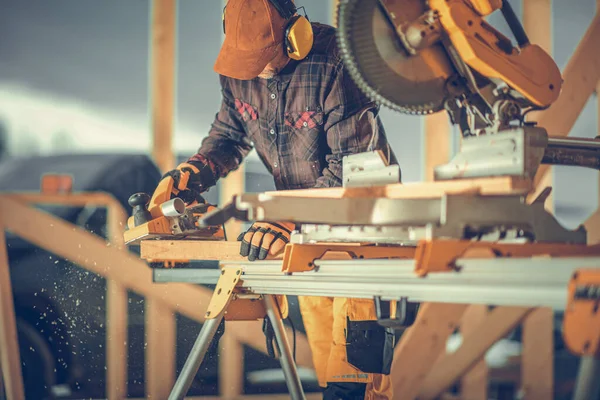 Carpentry Construction Worker Planing Wood Using Electric Planer Adjusting Plank — Fotografia de Stock