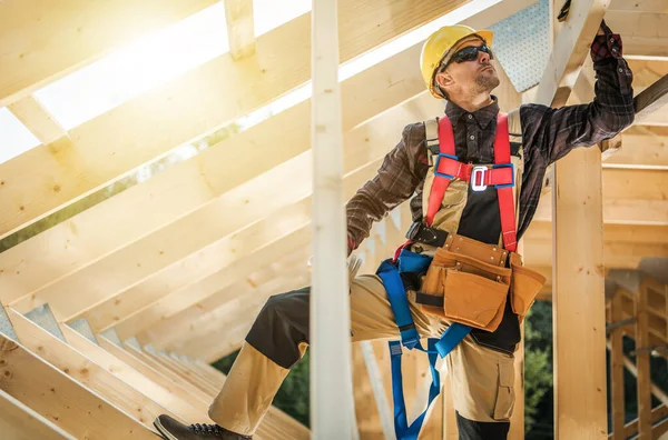 Caucasian Contractor Wearing Safety Harness Hard Hat Checking Solidity Installation — 图库照片