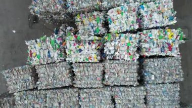 Aerial View of Squeezed Plastic Material Recovered in a Sorting Plant Awaiting Transport to Processing Facility. Waste Recycling Theme.